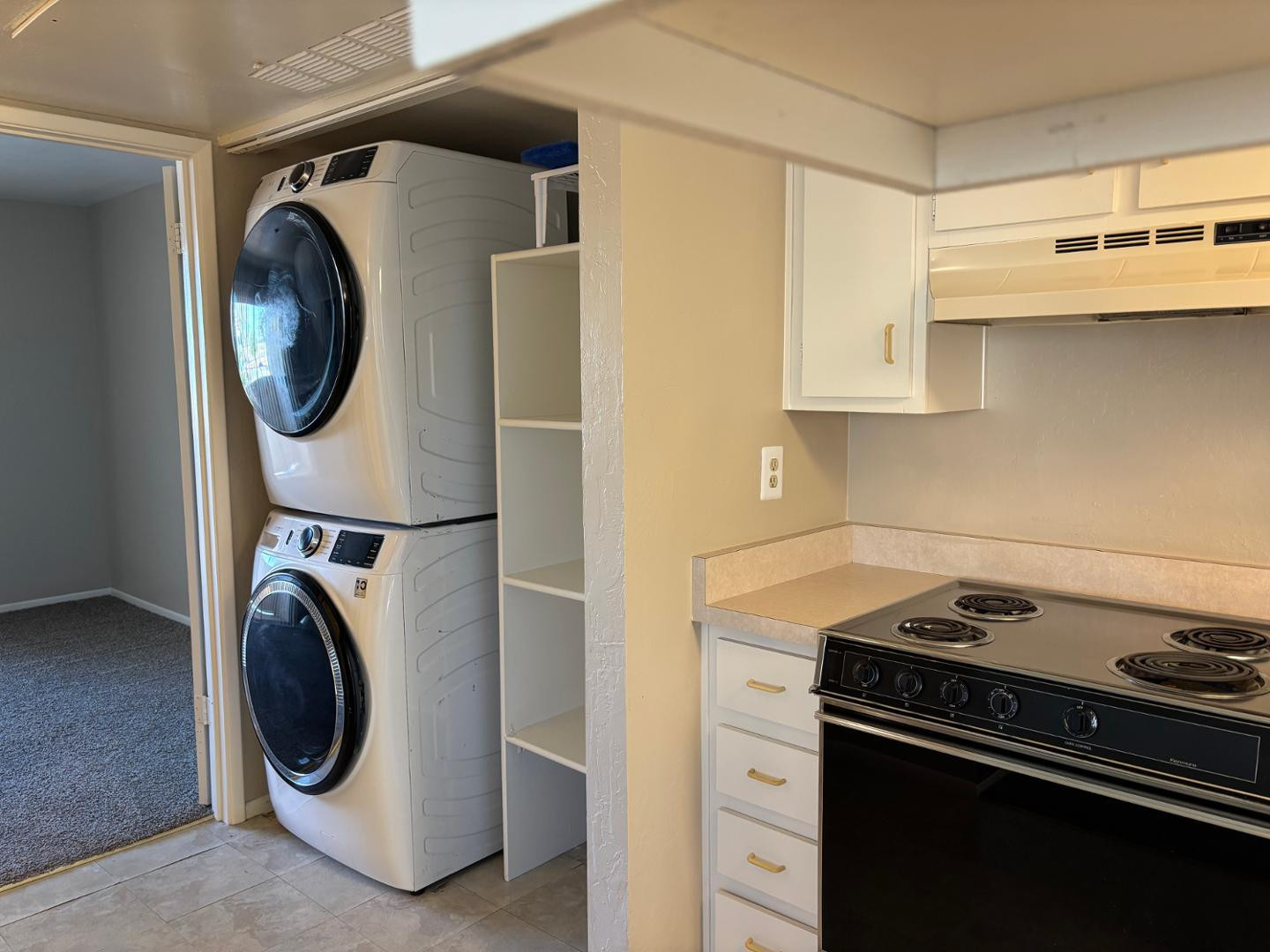 12123 West Bell Road, Unit 225 Surprise, AZ 85378 - Photo 6 of 12 a utility room with dryer and washer