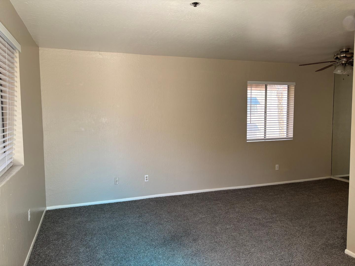 12123 West Bell Road, Unit 225 Surprise, AZ 85378 - Photo 7 of 12 an empty room with a window