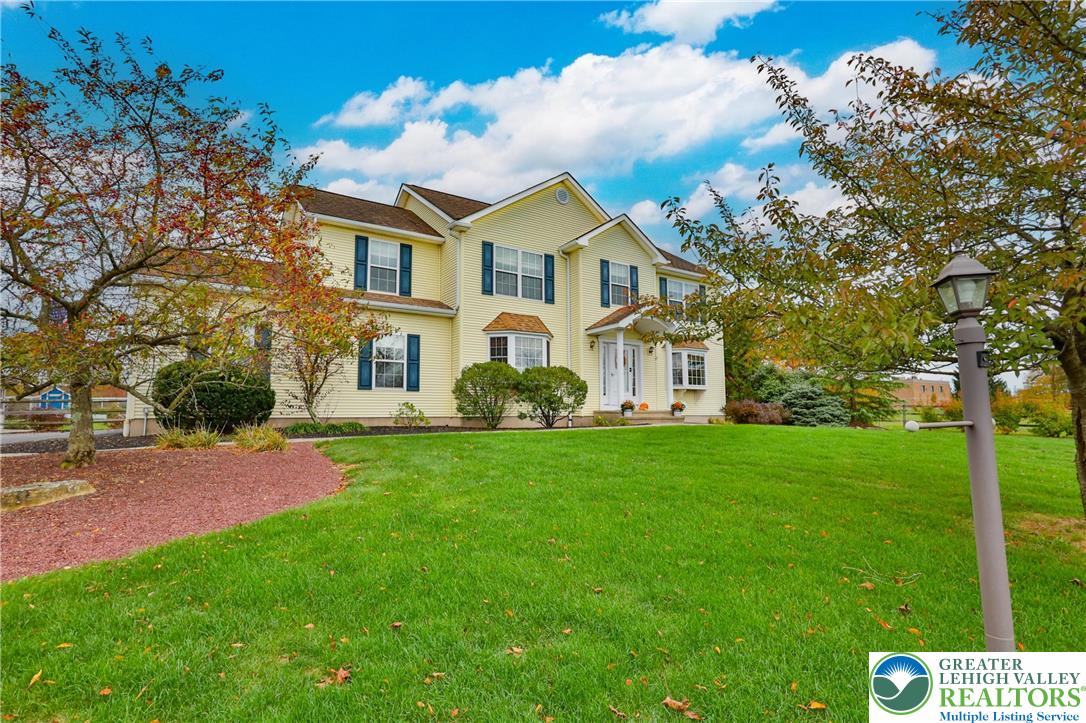 132 Belfast Road Nazareth, PA 18064 - Photo 1 of 1 a view of a yard in front of a house with large trees