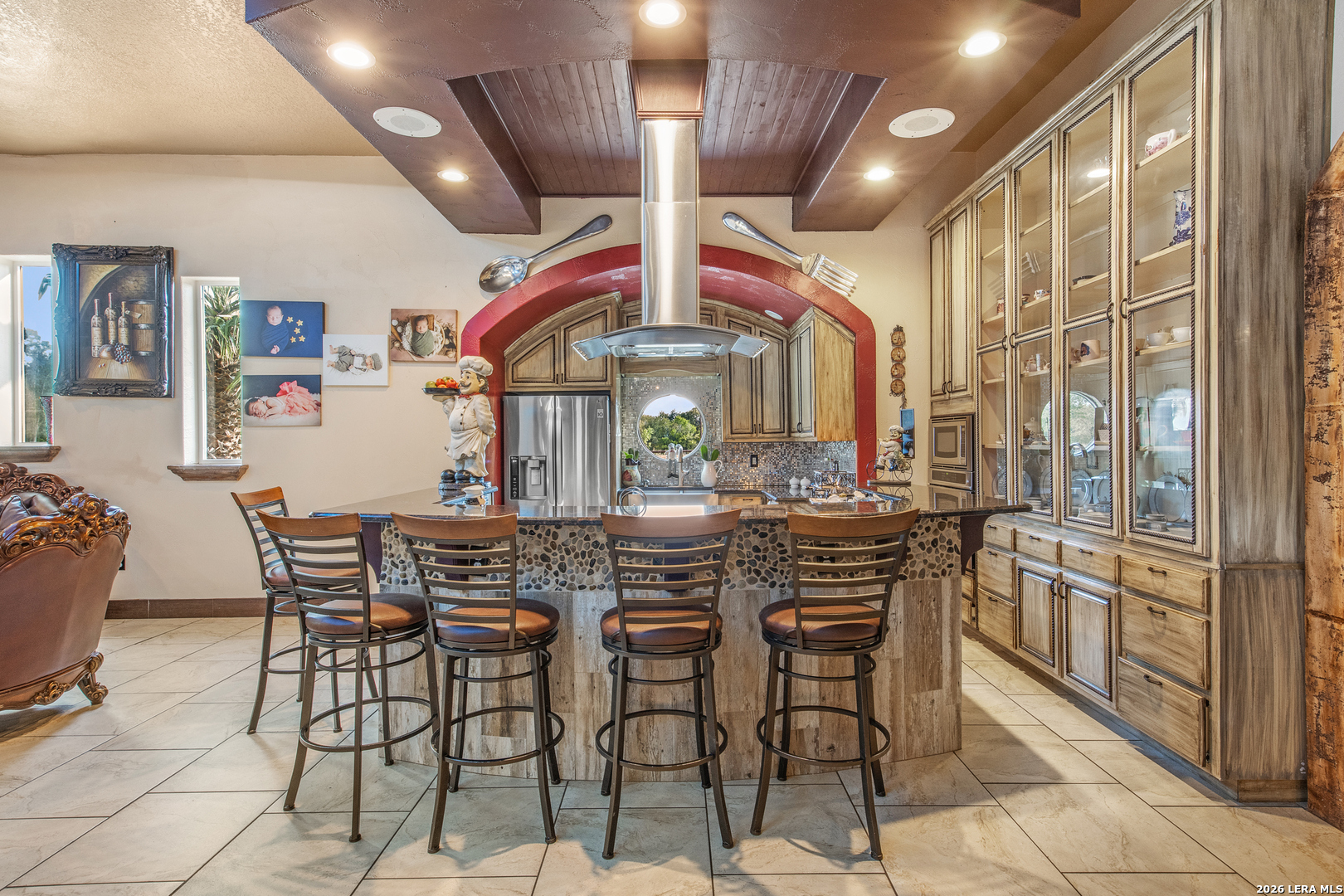 13196 Kelly Road Atascosa, TX 78002 - Photo 12 of 25 a view of a dining room with furniture and chandelier