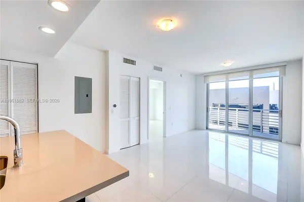 a spacious bathroom with a tub and shower
