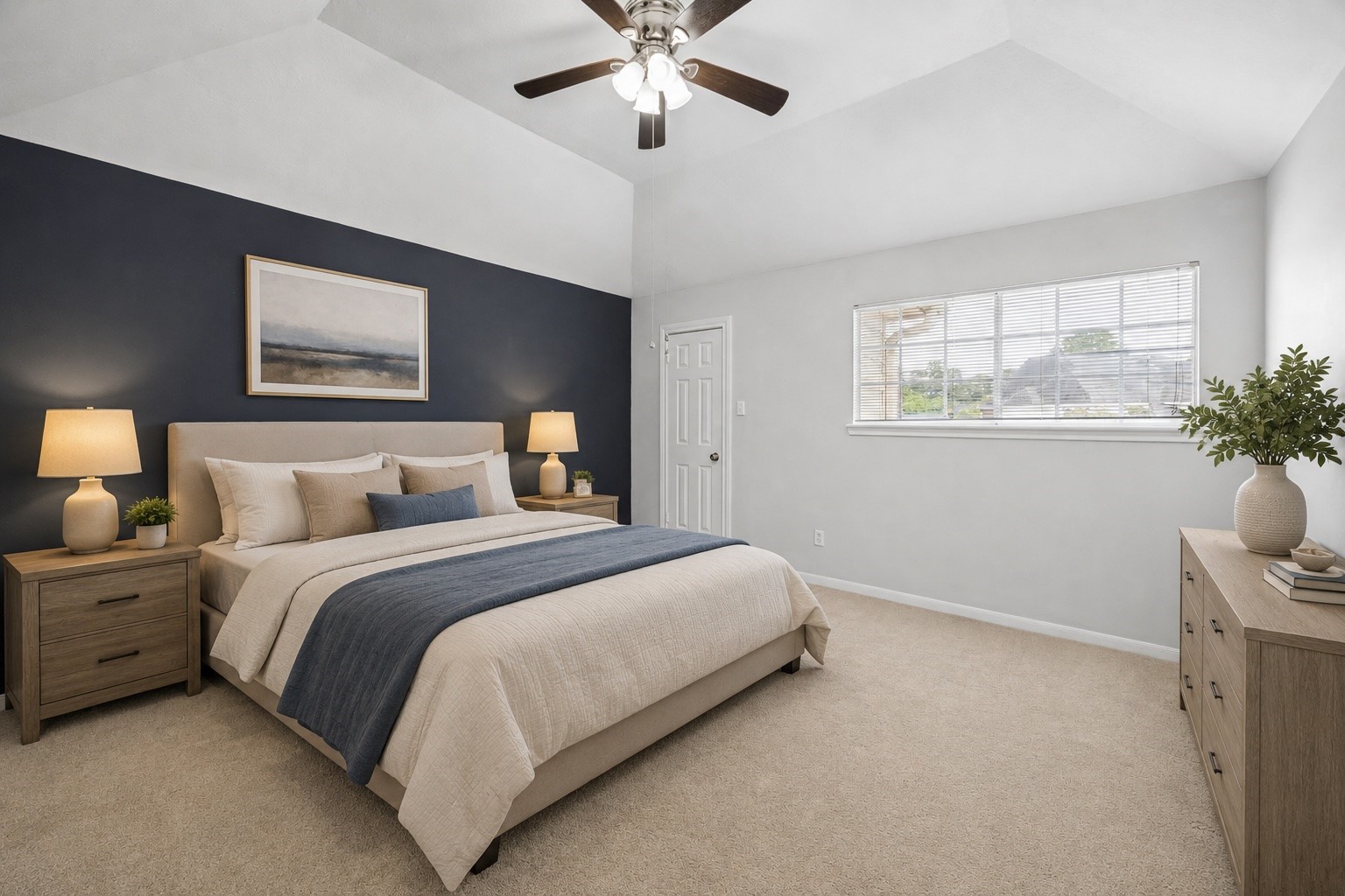 7915 Huddersfield Court Spring, TX 77379 - Photo 27 of 37 Secondary bedroom with vaulted ceiling, generous natural light, and a bold accent wall that adds character to the space. - virtually staged
