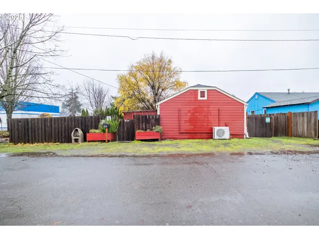 a view of a backyard with a garden