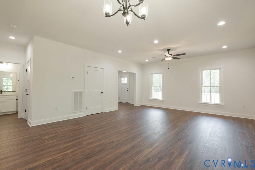 Lot 1 Robertson Town Road Bumpass, VA 23024 - Photo 13 of 40 a view of an empty room with wooden floor and a window
