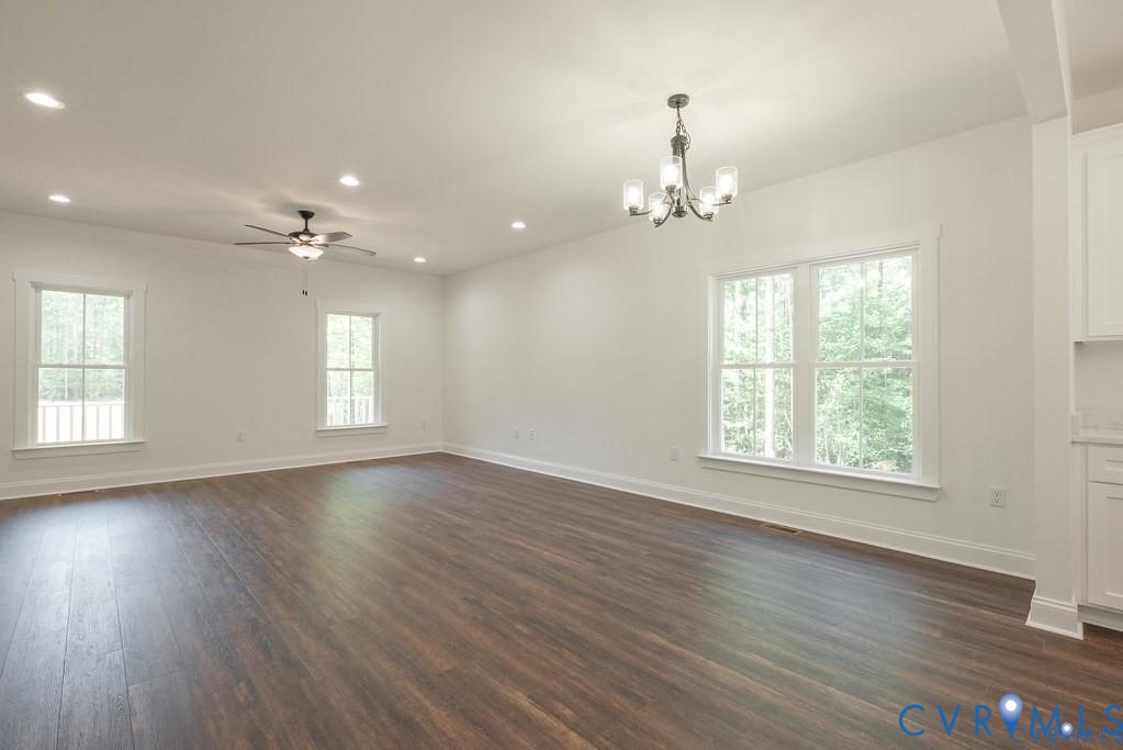 Lot 1 Robertson Town Road Bumpass, VA 23024 - Photo 15 of 40 a view of an empty room with wooden floor and a window