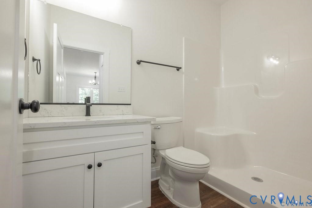 Lot 1 Robertson Town Road Bumpass, VA 23024 - Photo 23 of 40 a bathroom with a sink a toilet and shower