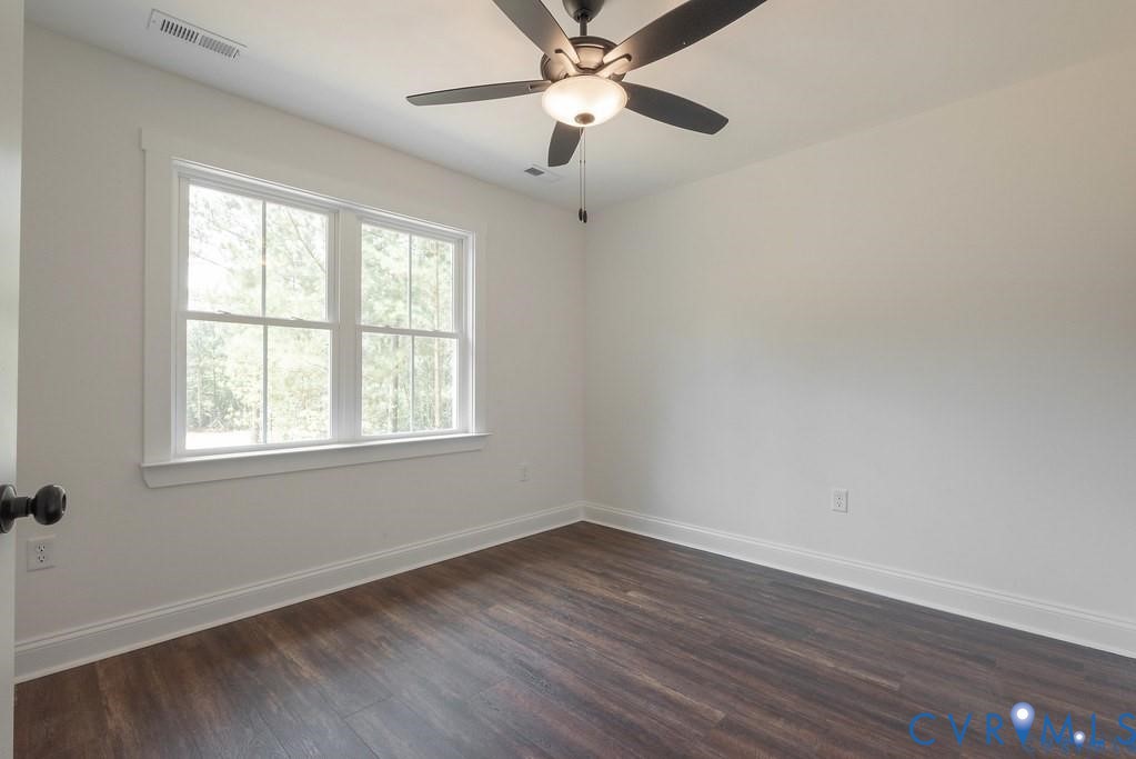 Lot 1 Robertson Town Road Bumpass, VA 23024 - Photo 37 of 40 wooden floor in an empty room with a window