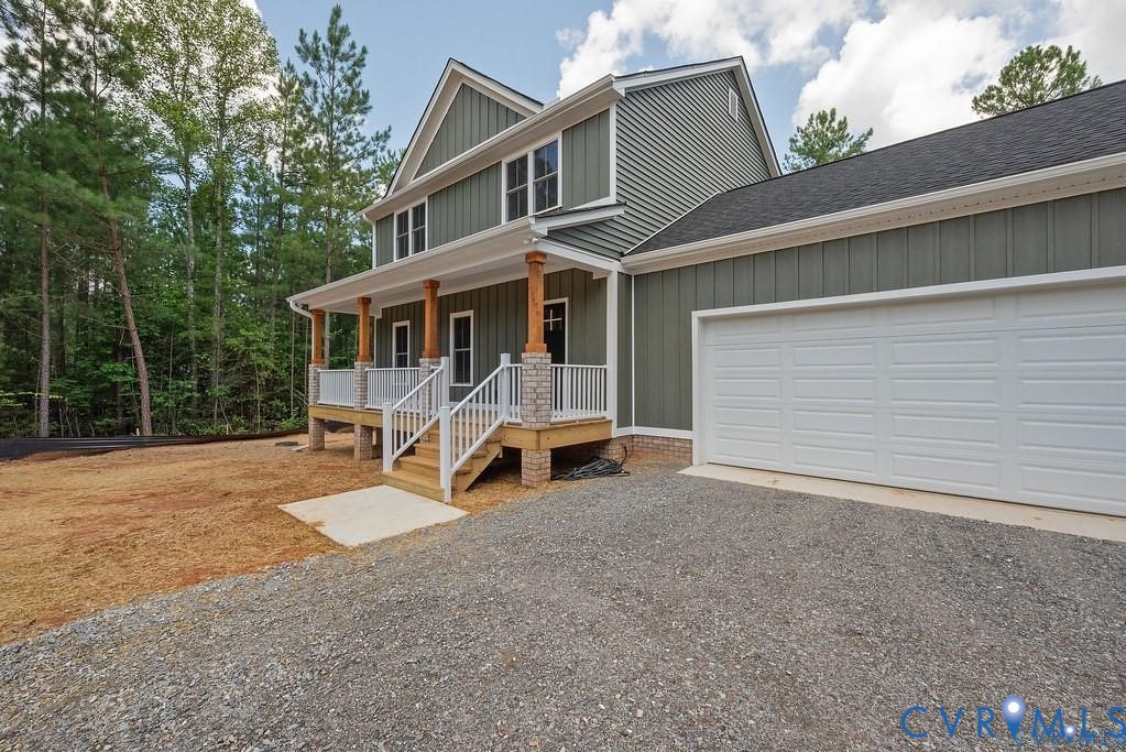 Lot 1 Robertson Town Road Bumpass, VA 23024 - Photo 5 of 40 a view of a house with a yard and balcony
