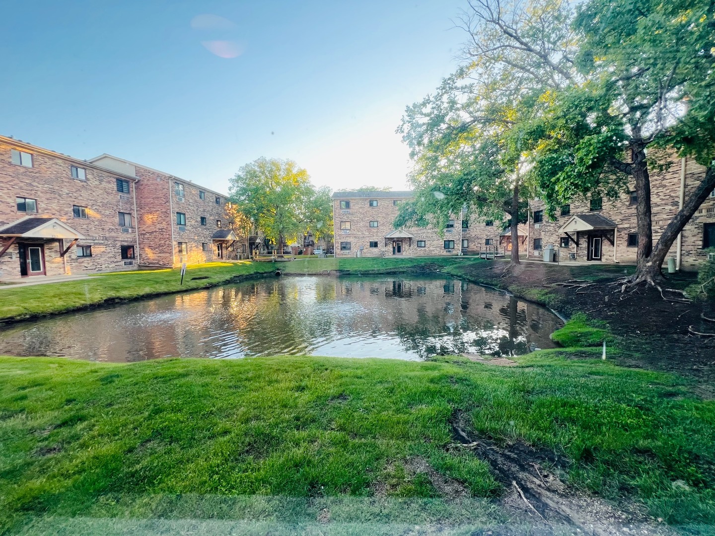 2219 Nichols Road, Unit 17A Arlington Heights, IL 60004 - Photo 19 of 19 a view of a lake with houses