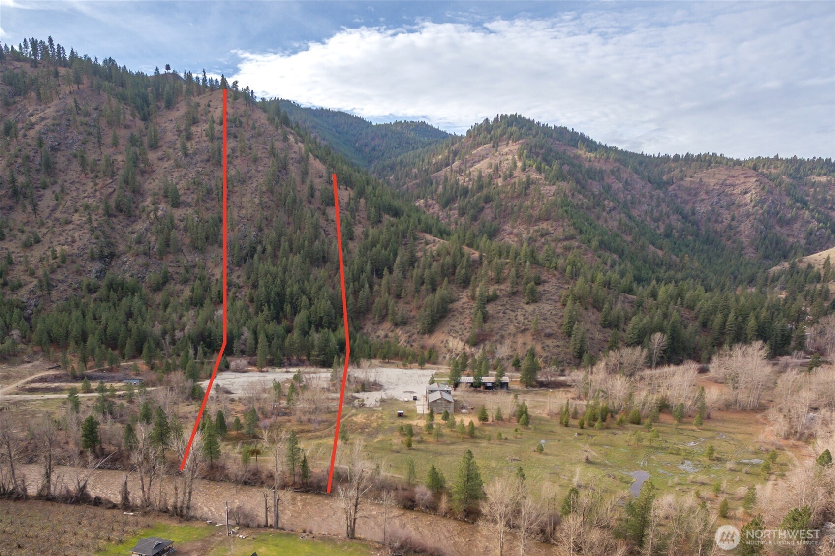 309 Mad Ranch Lane Entiat, WA 98822 - Photo 3 of 15 a view of a town with mountains