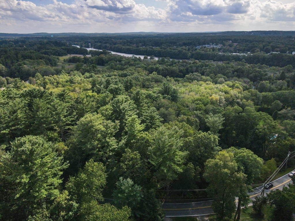 123 Sherburne Avenue Tyngsborough, MA 01879 - Photo 3 of 11 an aerial view of residential houses with outdoor space and trees
