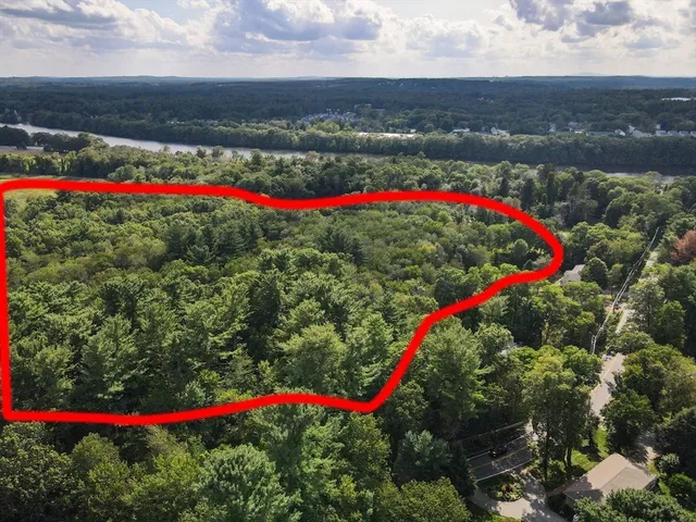 a view of a yard and a houses