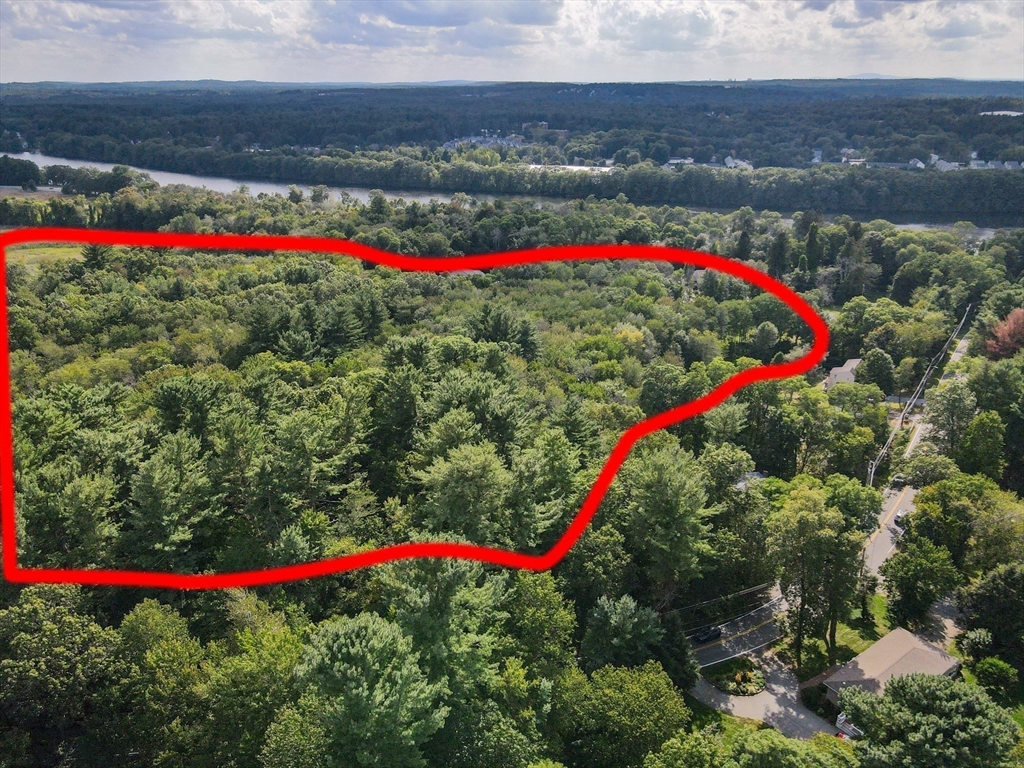 123 Sherburne Avenue Tyngsborough, MA 01879 - Photo 6 of 11 a view of a backyard