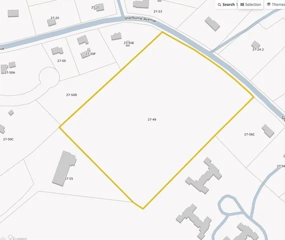 a view of a yard with large trees