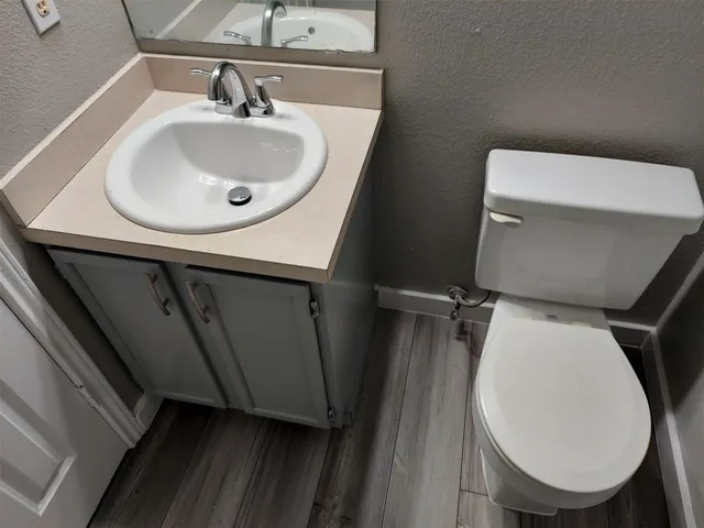 a bathroom with a glass door shower
