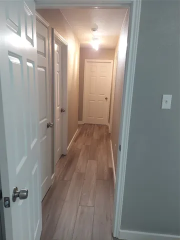 a bathroom with a sink toilet and a mirror