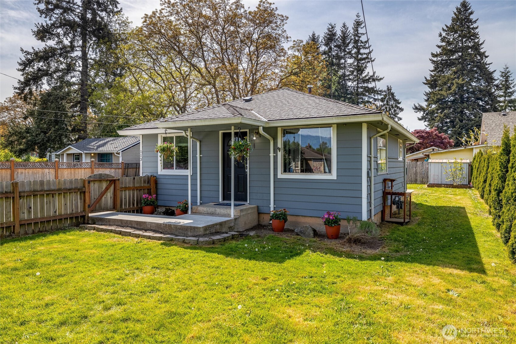113 South Gardner Road Burlington, WA 98233 - Photo 25 of 40 a view of a house with a yard patio and fire pit