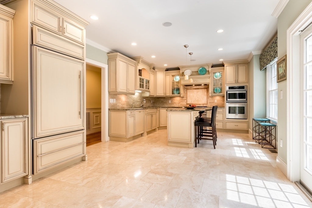 171 Old Farm Road Newton, MA 02459 - Photo 13 of 37 a view of kitchen with stainless steel appliances refrigerator oven and cabinets