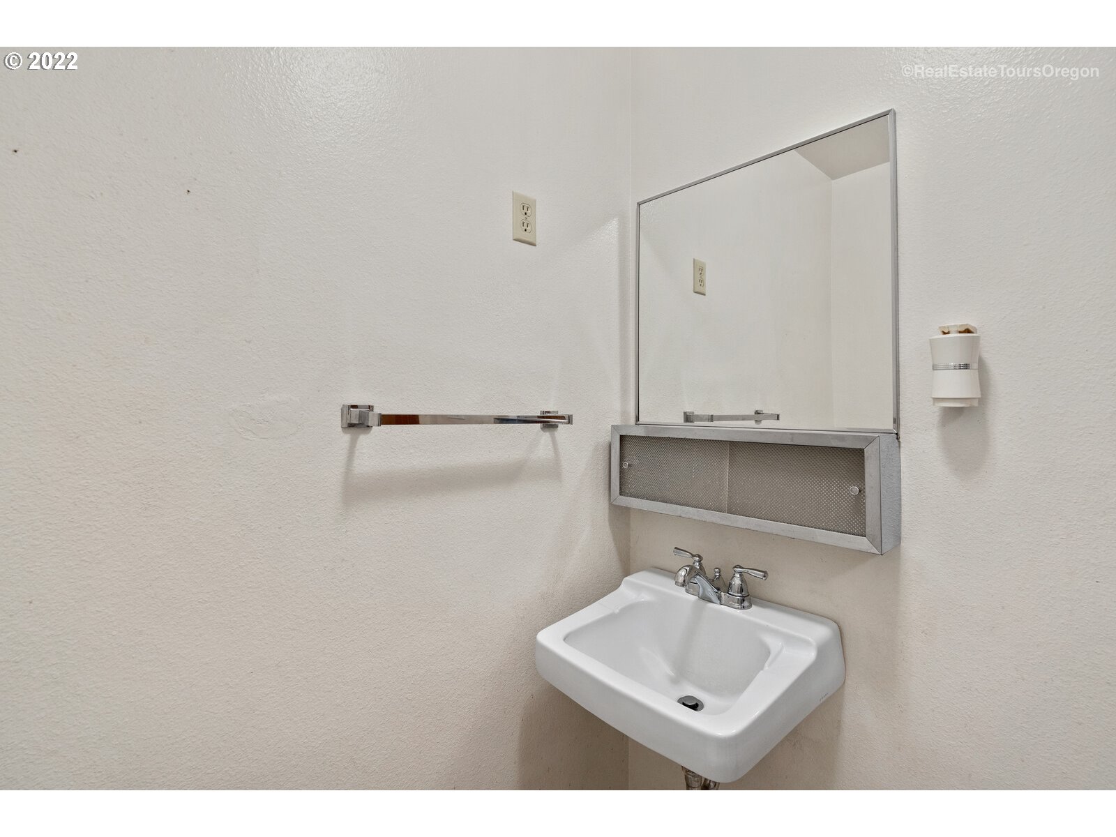 16901 Southeast Haig Street Portland, OR 97236 - Photo 29 of 32 a bathroom with a sink and mirror