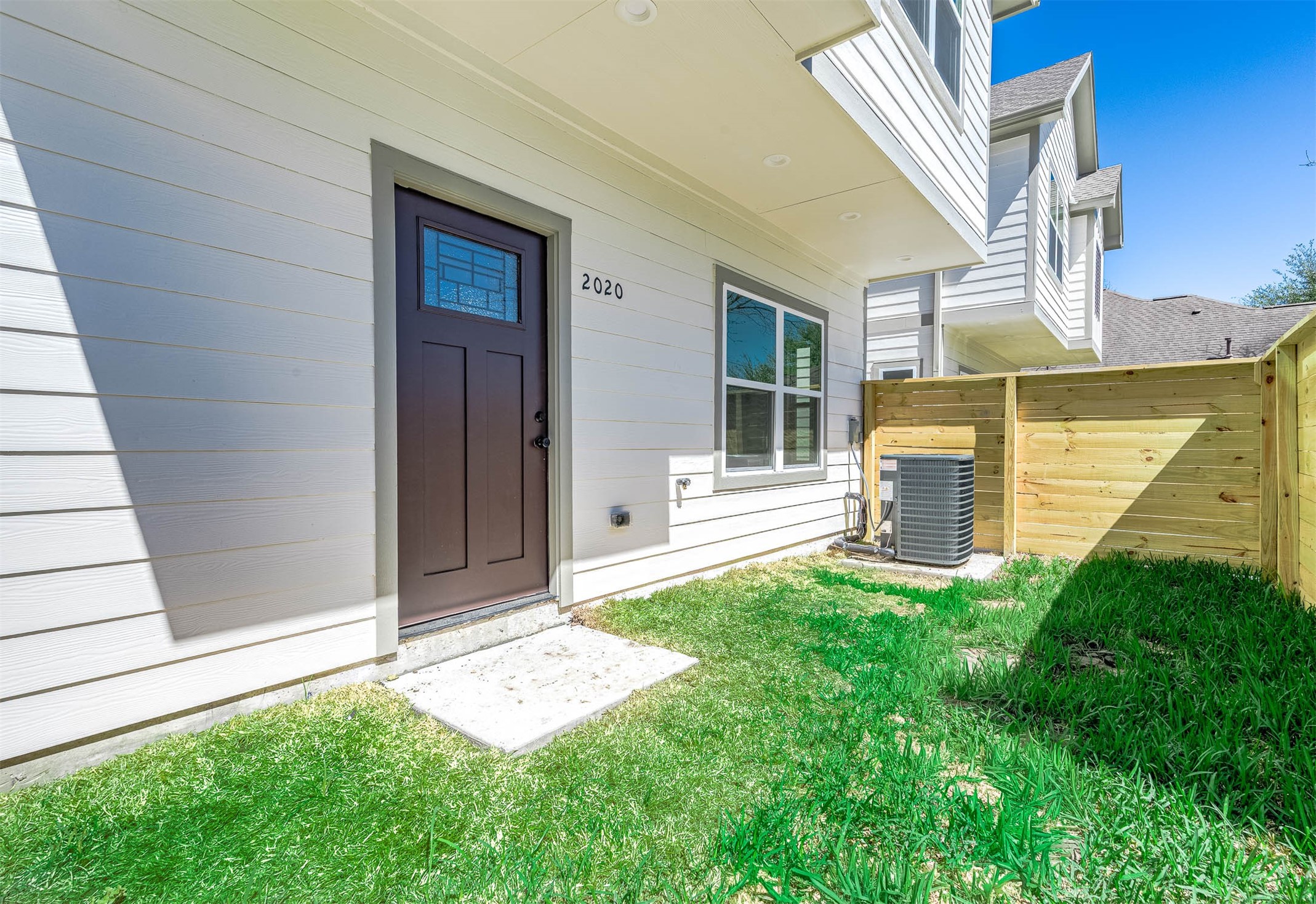 2020 Hampton Street, Unit A B Houston, TX 77088 - Photo 27 of 31 a view of a house with a yard