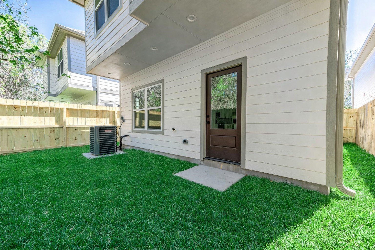 2020 Hampton Street, Unit A B Houston, TX 77088 - Photo 28 of 31 front view of a house with a yard