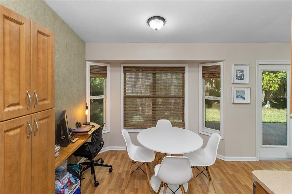 508 Northwest 94th Way Gainesville, FL 32607 - Photo 14 of 30 a view of a dining room with furniture window and outside view
