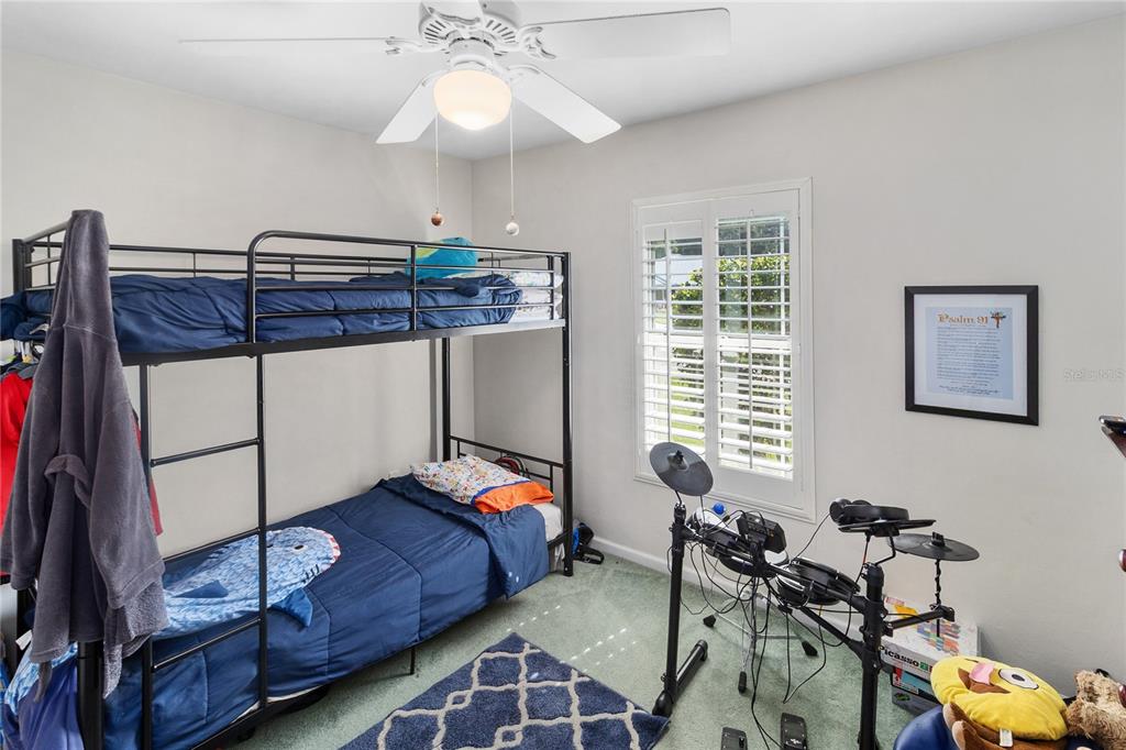 508 Northwest 94th Way Gainesville, FL 32607 - Photo 16 of 30 a bedroom with furniture and a window