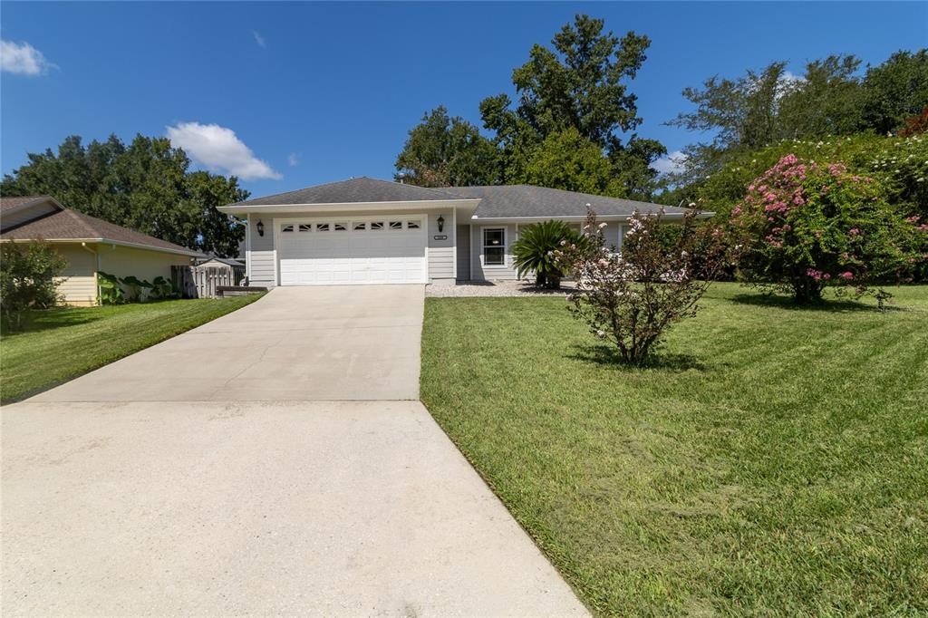 508 Northwest 94th Way Gainesville, FL 32607 - Photo 3 of 30 a view of house with outdoor space porch and garden
