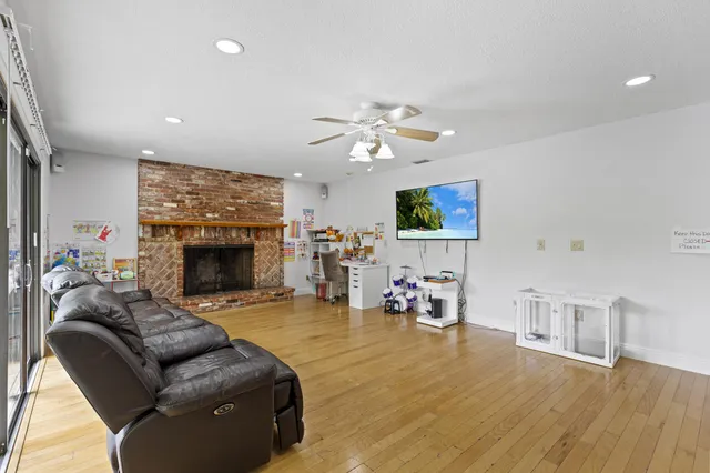 a kitchen with lots of counter top space sink and stainless steel appliances