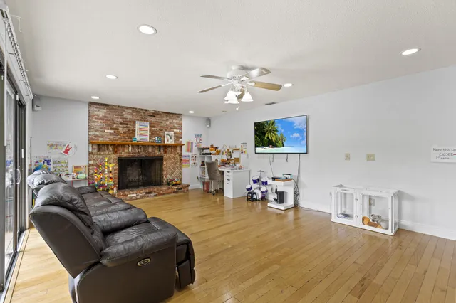 a bedroom with a bed and glass windows