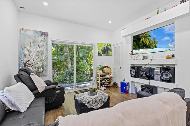 a bedroom with a bed and dresser