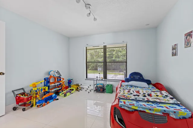 a view of a house with a yard porch and sitting area