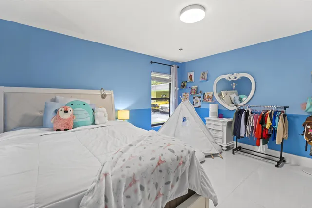 a kitchen that has a sink and a stove in it