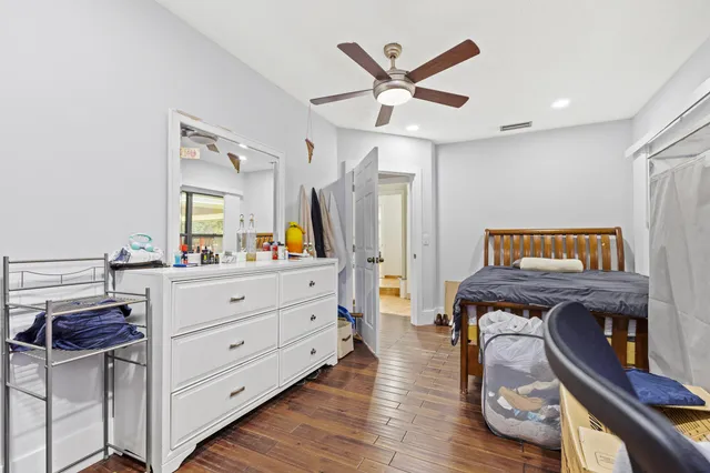 a kitchen with appliances cabinets and a window