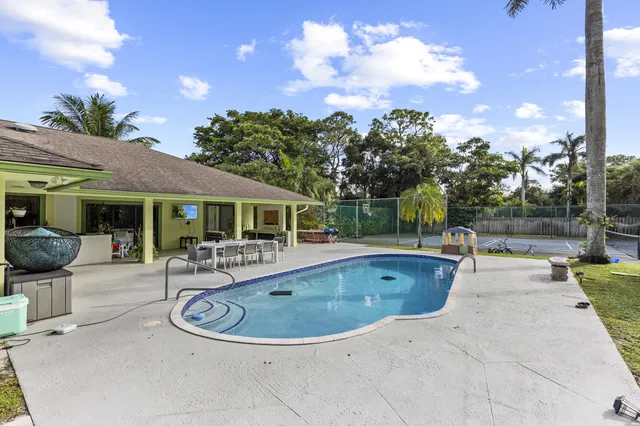 $1,299,999 | 6438 Gun Club Road, West Palm Beach, FL 33415