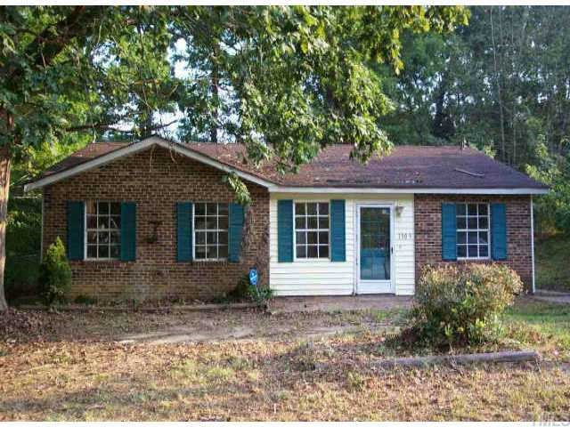 1309 Armstrong Circle Raleigh, NC 27610 - Photo 1 of 1 a front view of a house with garden