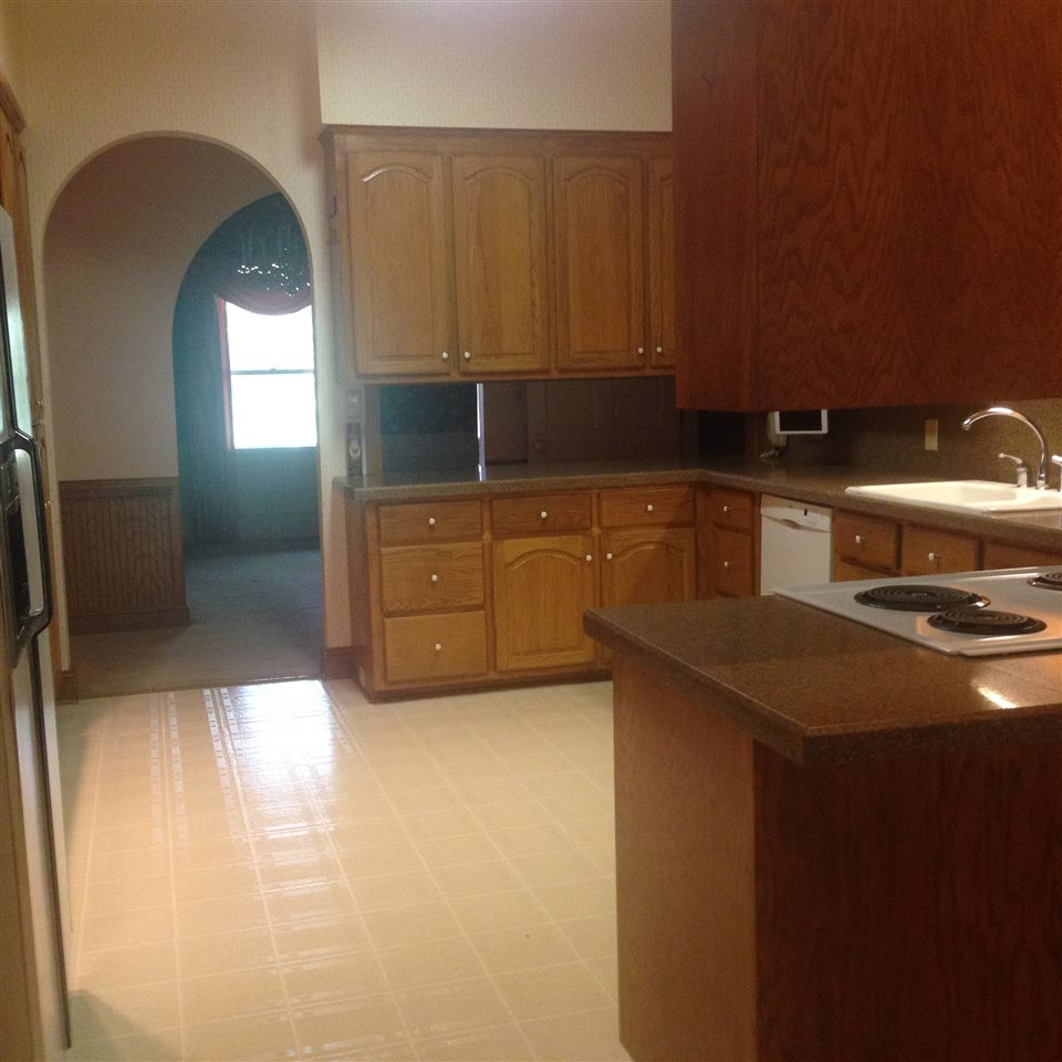 9919 Quail Roost Road Bahama, NC 27503 - Photo 21 of 25 Kitchen looking into formal dining room