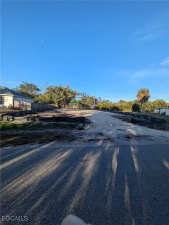a view of a street with a houses