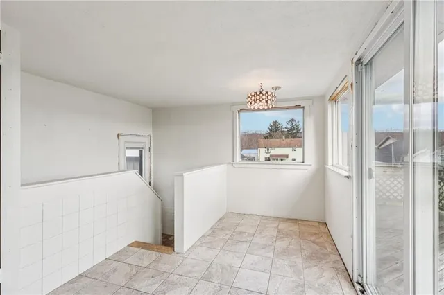 a kitchen with stainless steel appliances a refrigerator and a sink