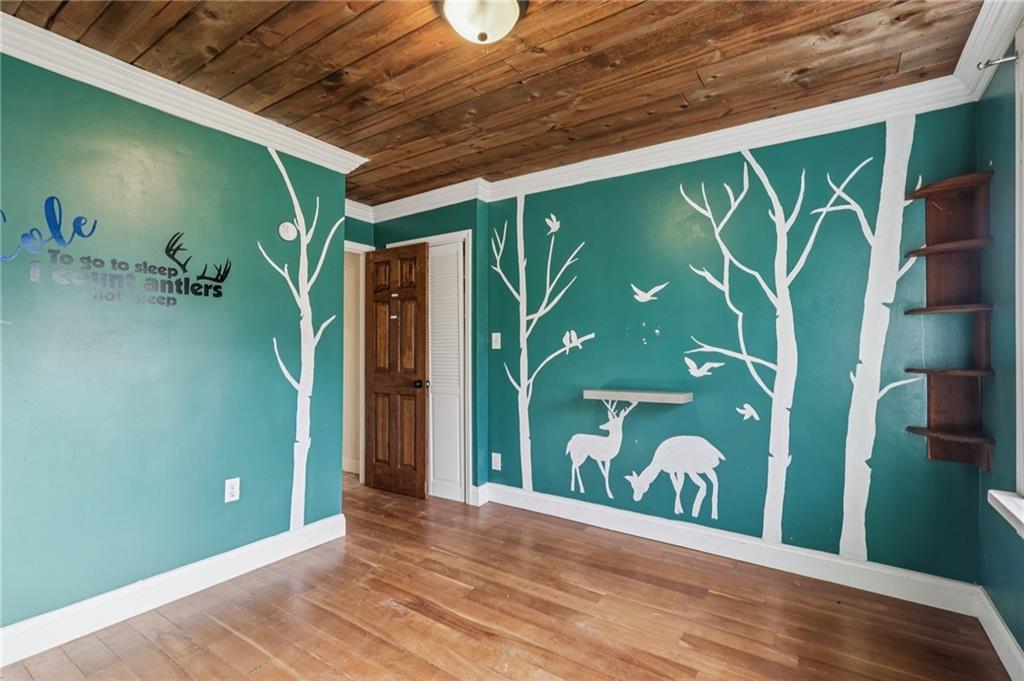 32 Stadium Road Millsboro, PA 15348 - Photo 31 of 47 a view of a door and wooden floor