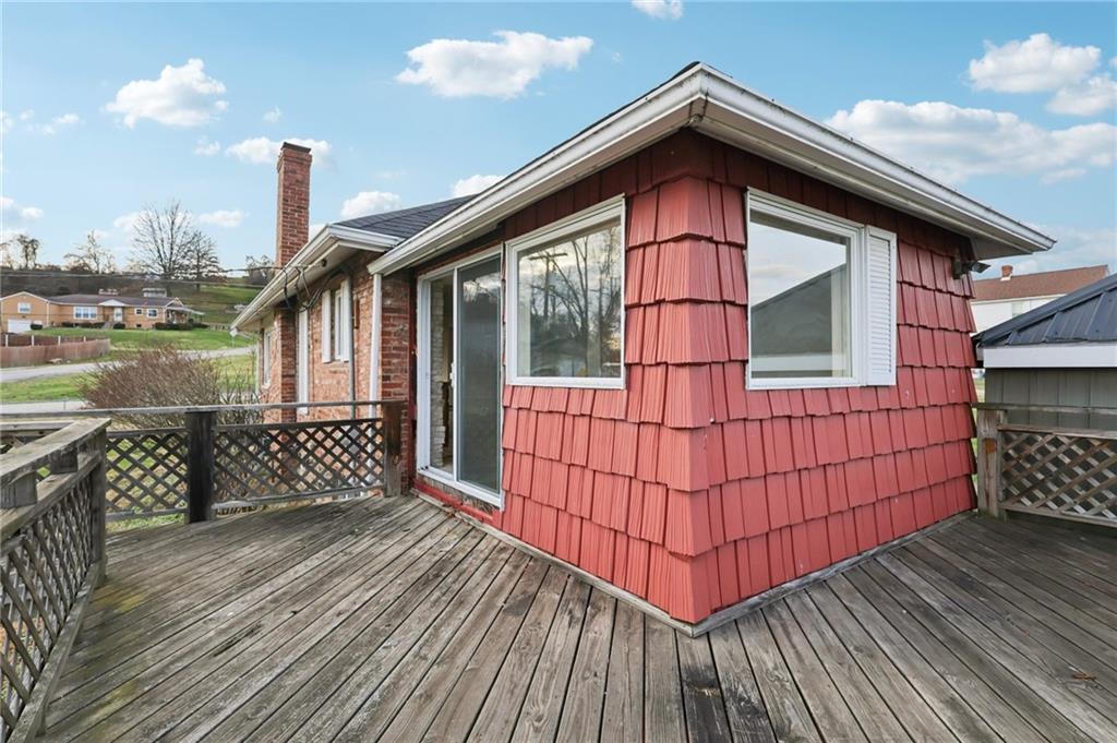 32 Stadium Road Millsboro, PA 15348 - Photo 42 of 47 a view of a house with wooden deck