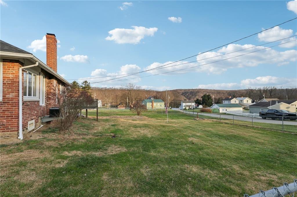32 Stadium Road Millsboro, PA 15348 - Photo 44 of 47 a view of a town with mountains in the background