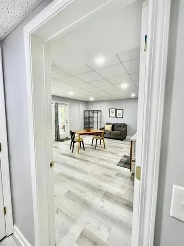a view of a patio with a table and chairs