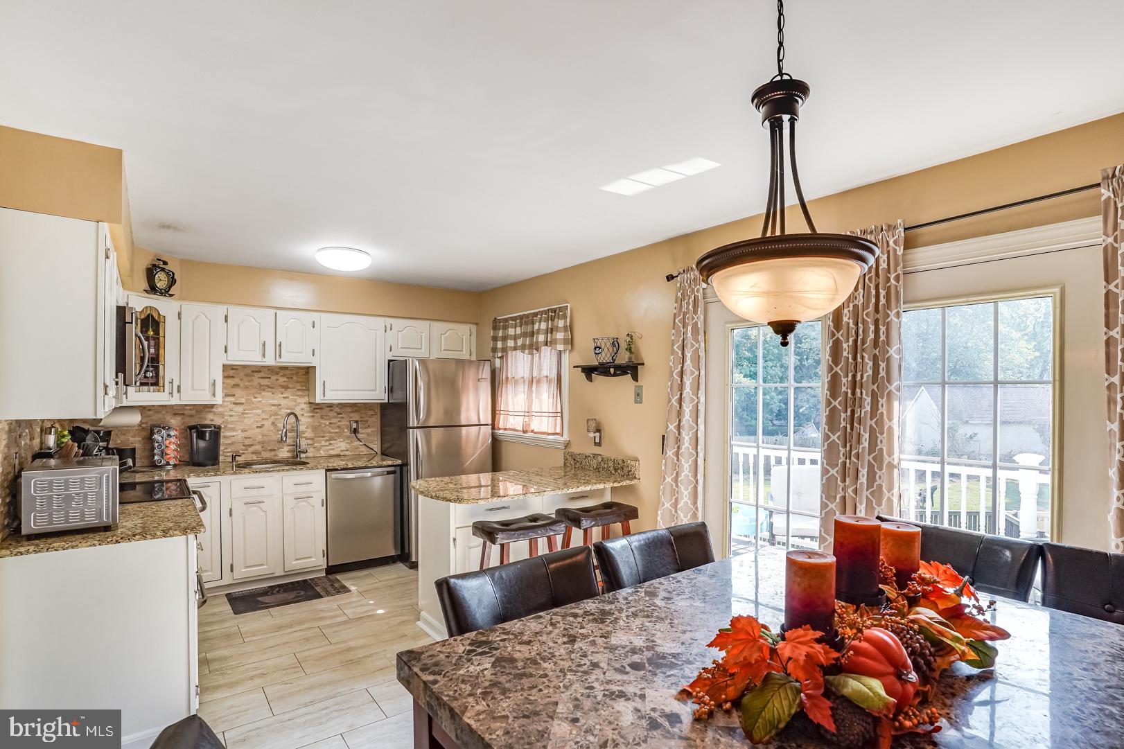 200 Long Point Road Stevensville, MD 21666 - Photo 2 of 28 View of the Kitchen and Dining on the Upper Level