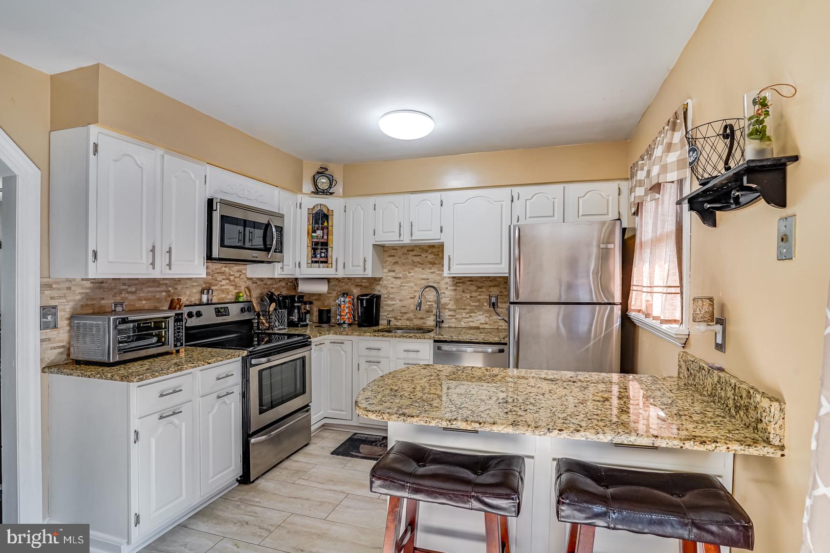 200 Long Point Road Stevensville, MD 21666 - Photo 3 of 28 Granite Countertops and Stainless Steel appliances