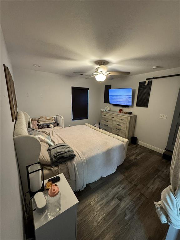 4752 County Line Road Mansfield, GA 30055 - Photo 8 of 15 a bedroom with bed and a tv