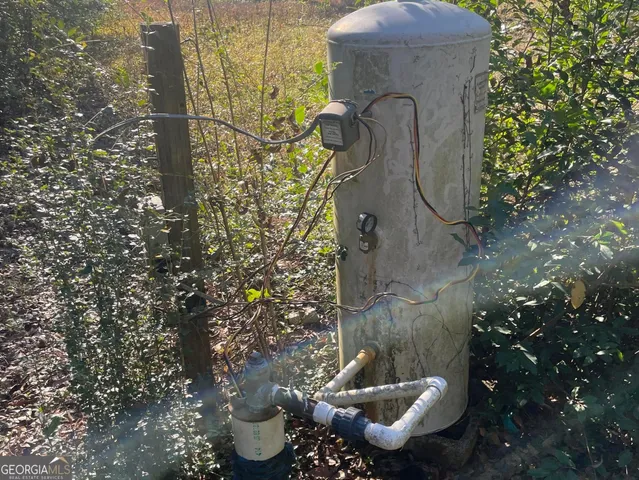 a bathroom with a toilet and shower