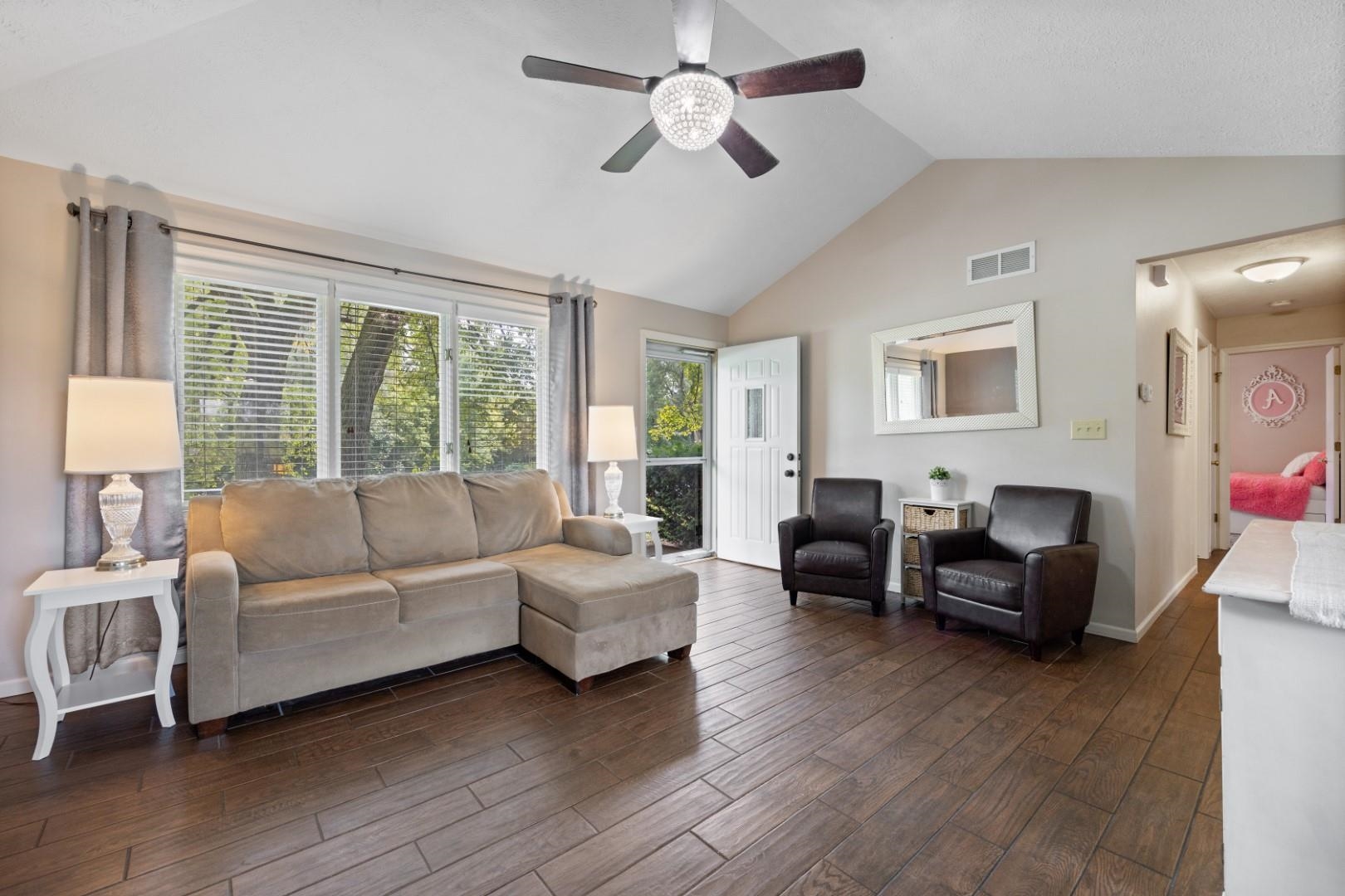 5568 Gray Eagle Road Roscoe, IL 61073 - Photo 12 of 45 a living room with furniture and a large window