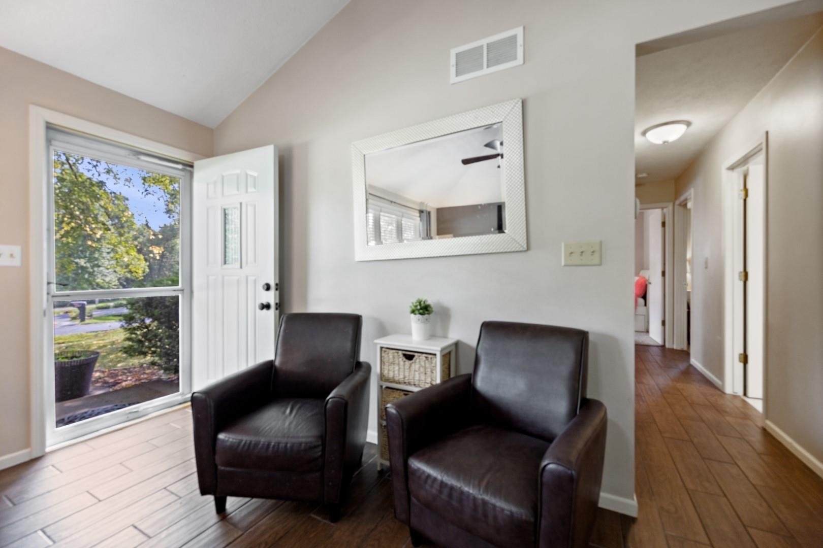 5568 Gray Eagle Road Roscoe, IL 61073 - Photo 13 of 45 a view of a livingroom with furniture and a window