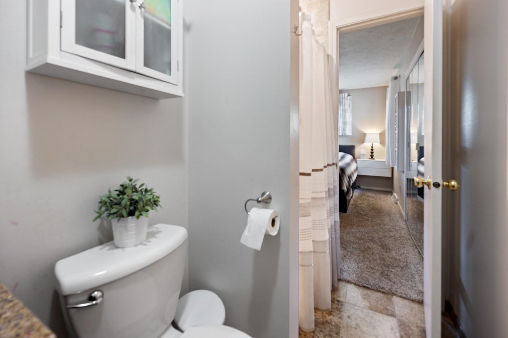 5568 Gray Eagle Road Roscoe, IL 61073 - Photo 18 of 45 a bathroom with a toilet